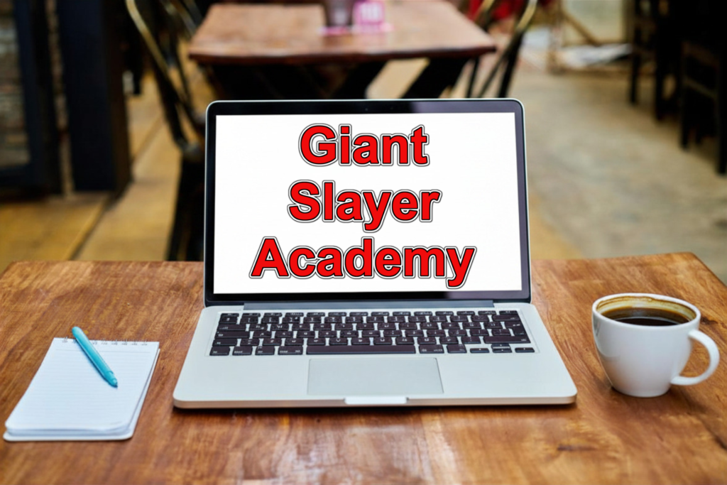 Laptop with the words Giant SLayer Academy on the screen